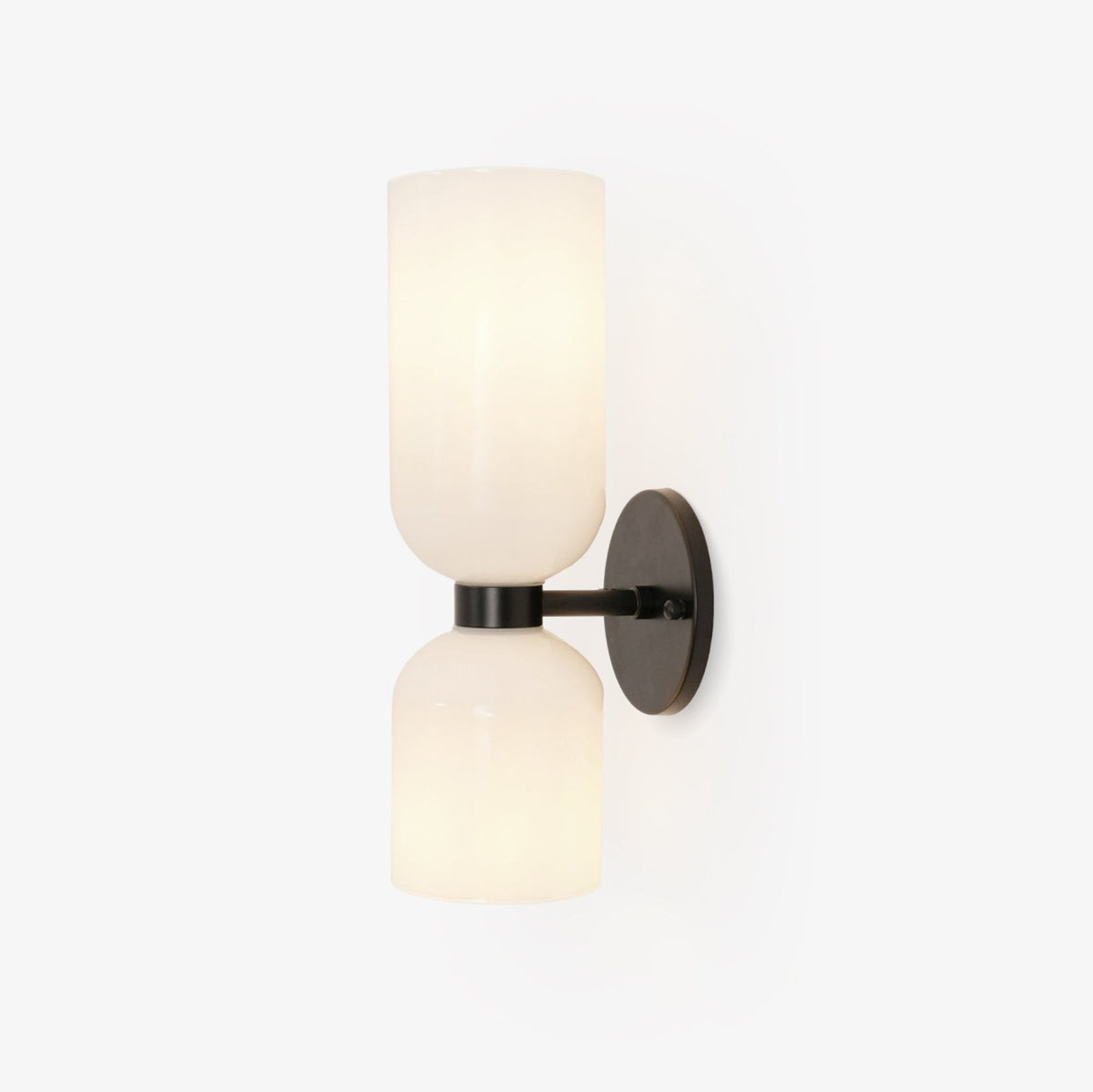 Centred on white, this matt black Clérachic sconce's opal glass shades sit unlit.
