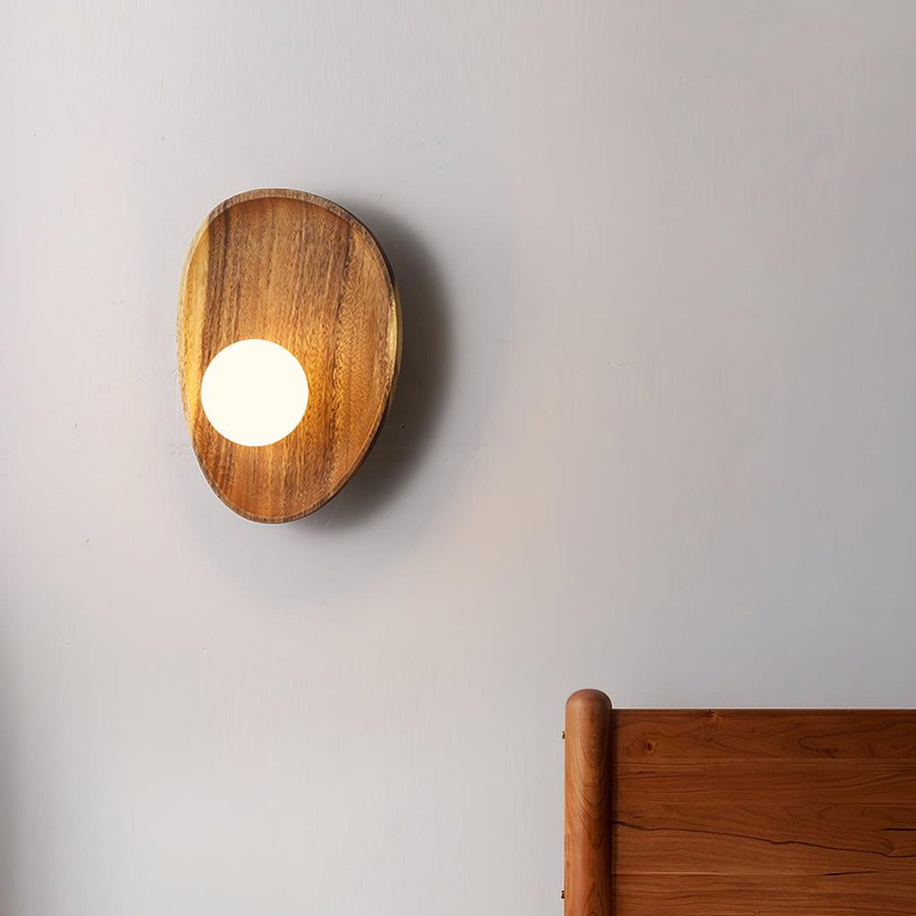 Walnut wood wall lamp shown in a minimal interior