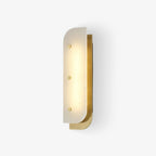 Elaris Alabaster Wall Light in brass, tall size, viewed straight on with the LED glowing behind the panel.