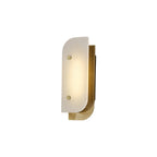 Elaris Alabaster Wall Light in the short size, brass backplate and two studs, glowing softly on white.