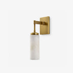 In brushed brass, this Clérachic wall sconce projects its alabaster drum shade from a squared backplate.