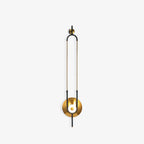 A Clérachic wall sconce is isolated on a pale grey background, shown smaller within the frame with extra space around it.