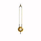 This Clérachic wall sconce is centred on a plain white background, its full gold loop and lit base shown with no shadow.