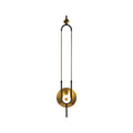 This Clérachic wall sconce is isolated on white, cropped close so its gold loop and lit base fill the frame.
