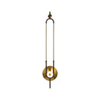 This Clérachic wall sconce is isolated on white, cropped close so its gold loop and lit base fill the frame.