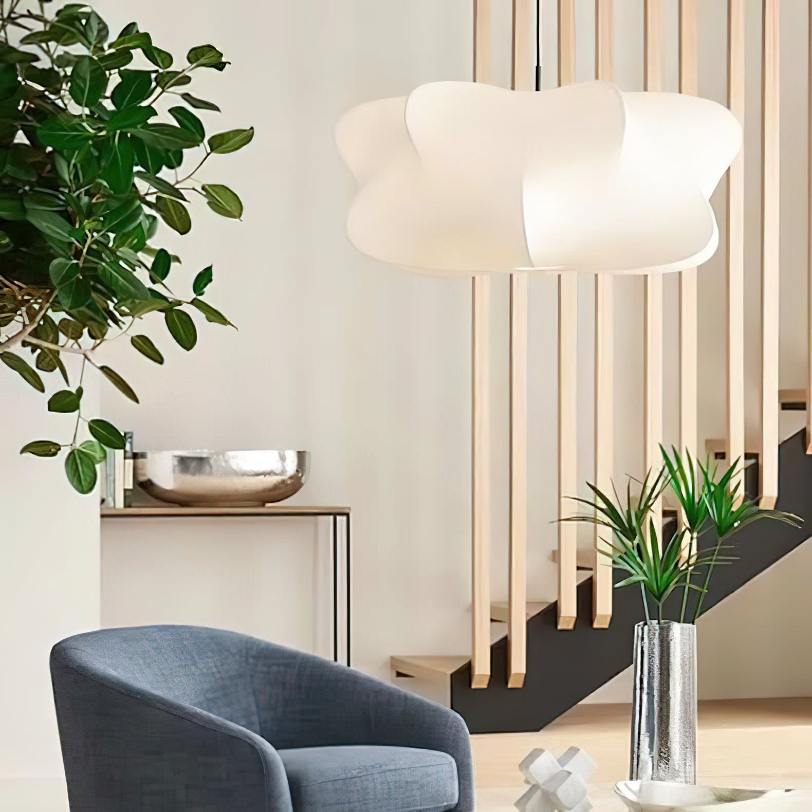Elysia pendant light hanging in a bright, airy living space
