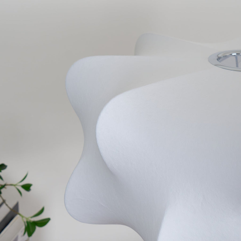 Elysia pendant light casting soft light in a modern room