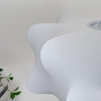 Elysia pendant light casting soft light in a modern room