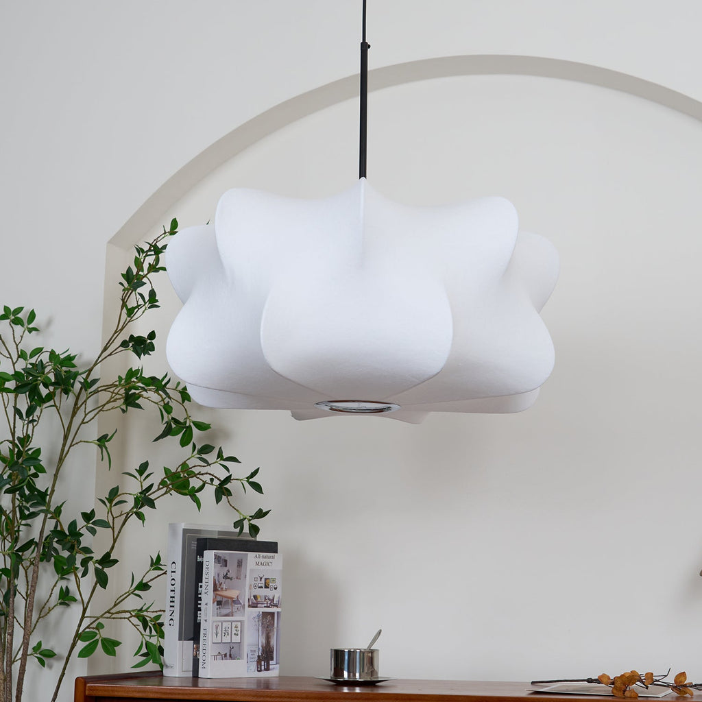 Silk strand pendant light glowing gently at night