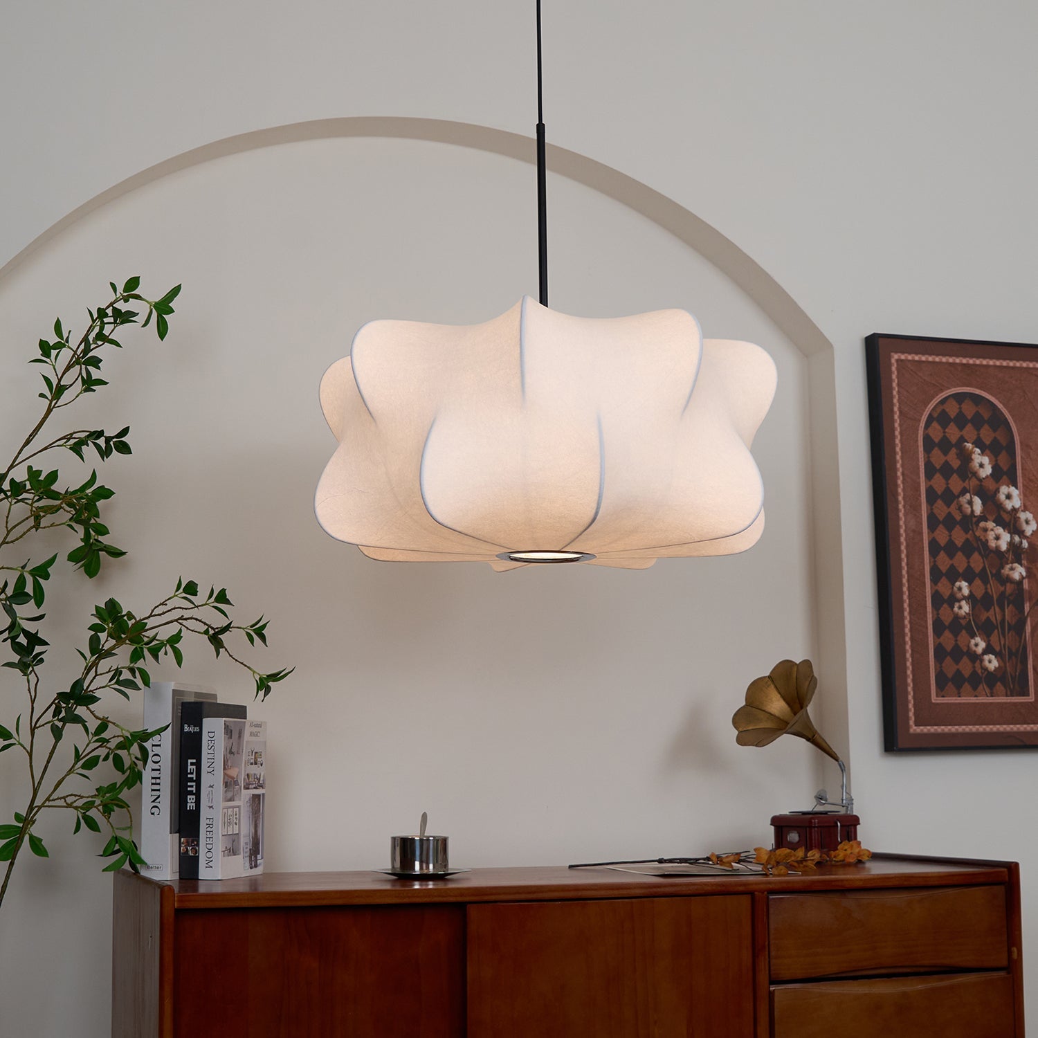 Cloud-shaped silk pendant light lighting a bedroom softly