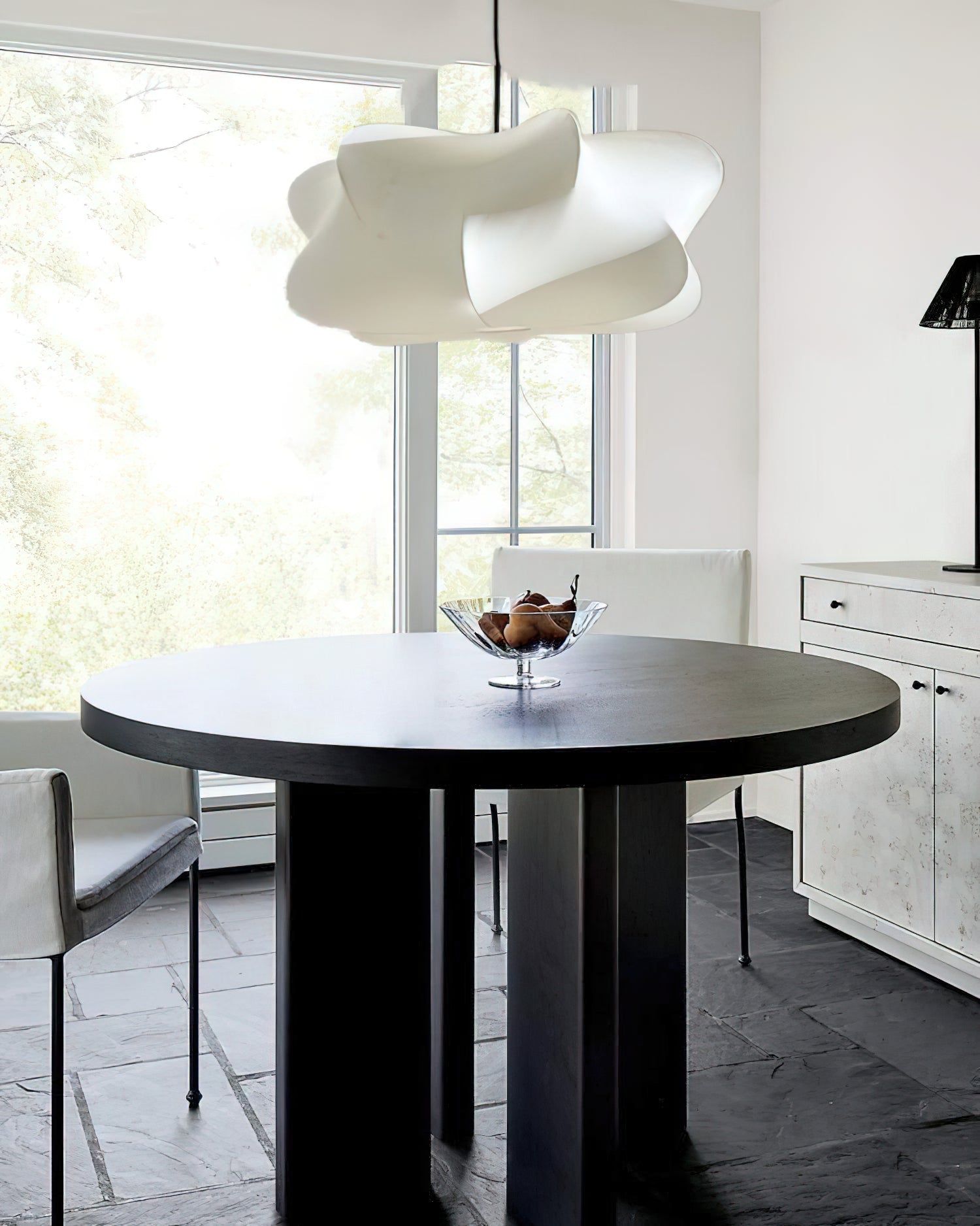 Silk strand pendant light hanging in a calm interior