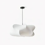 Cloud-like silk pendant light lighting a cosy corner