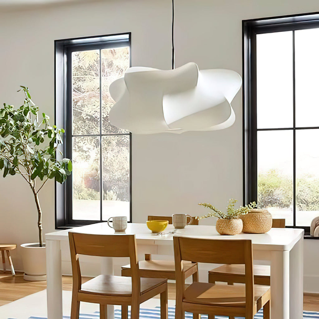 Cloud-like silk pendant light lighting a relaxed lounge