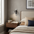 Recessed bedside wall sconce shown in a black and copper finish
