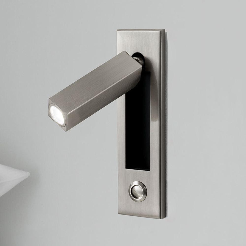 Embedded bedside sconce shown with its slim folding profile