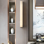Closer crop of the unlit Kristy lamp next to the vase niche, showing its slim rectangular body.