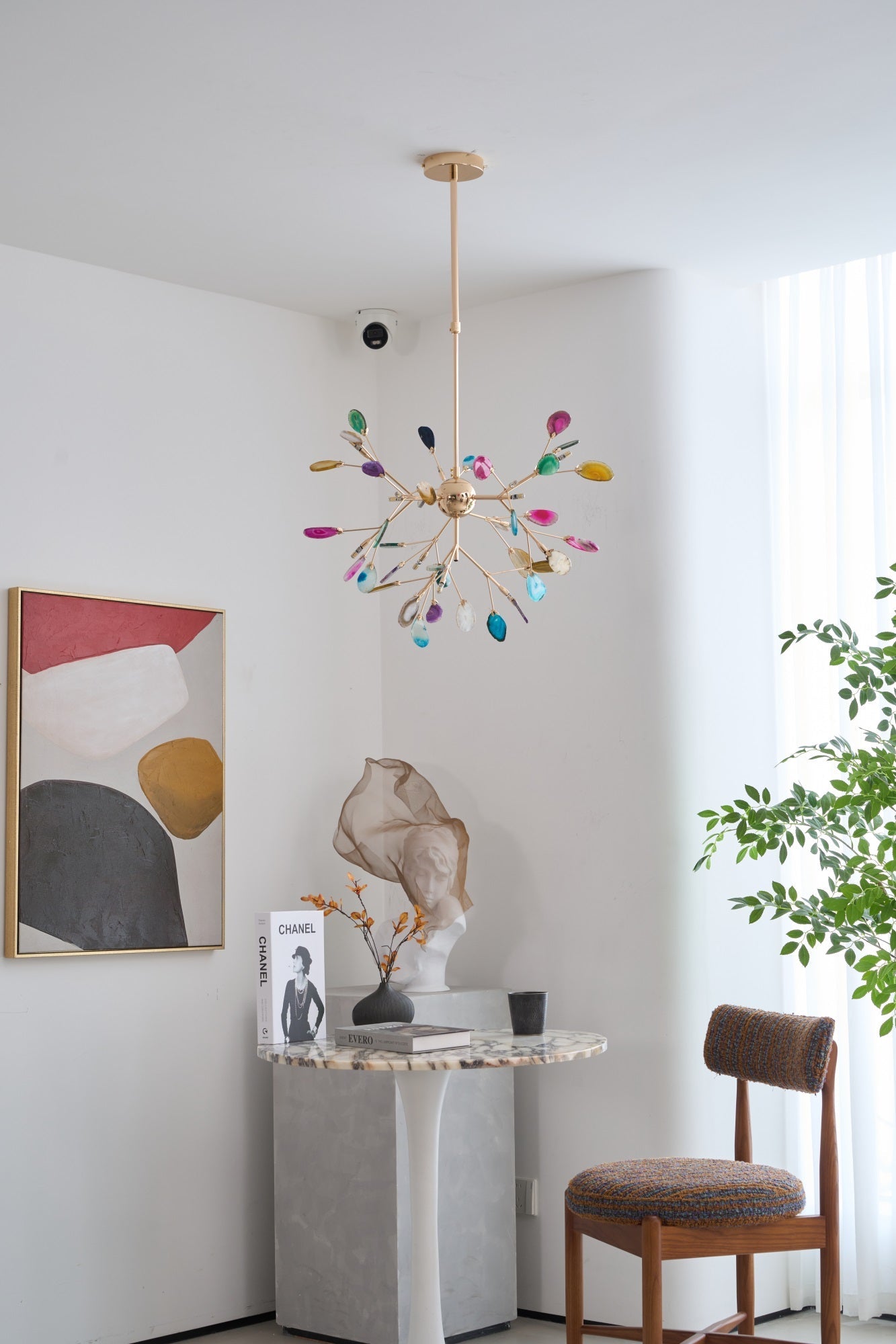 Lit agate chandelier with translucent stone slices overhead