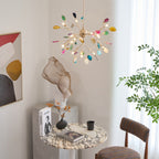 Agate slices and rose gold arms on a lit chandelier