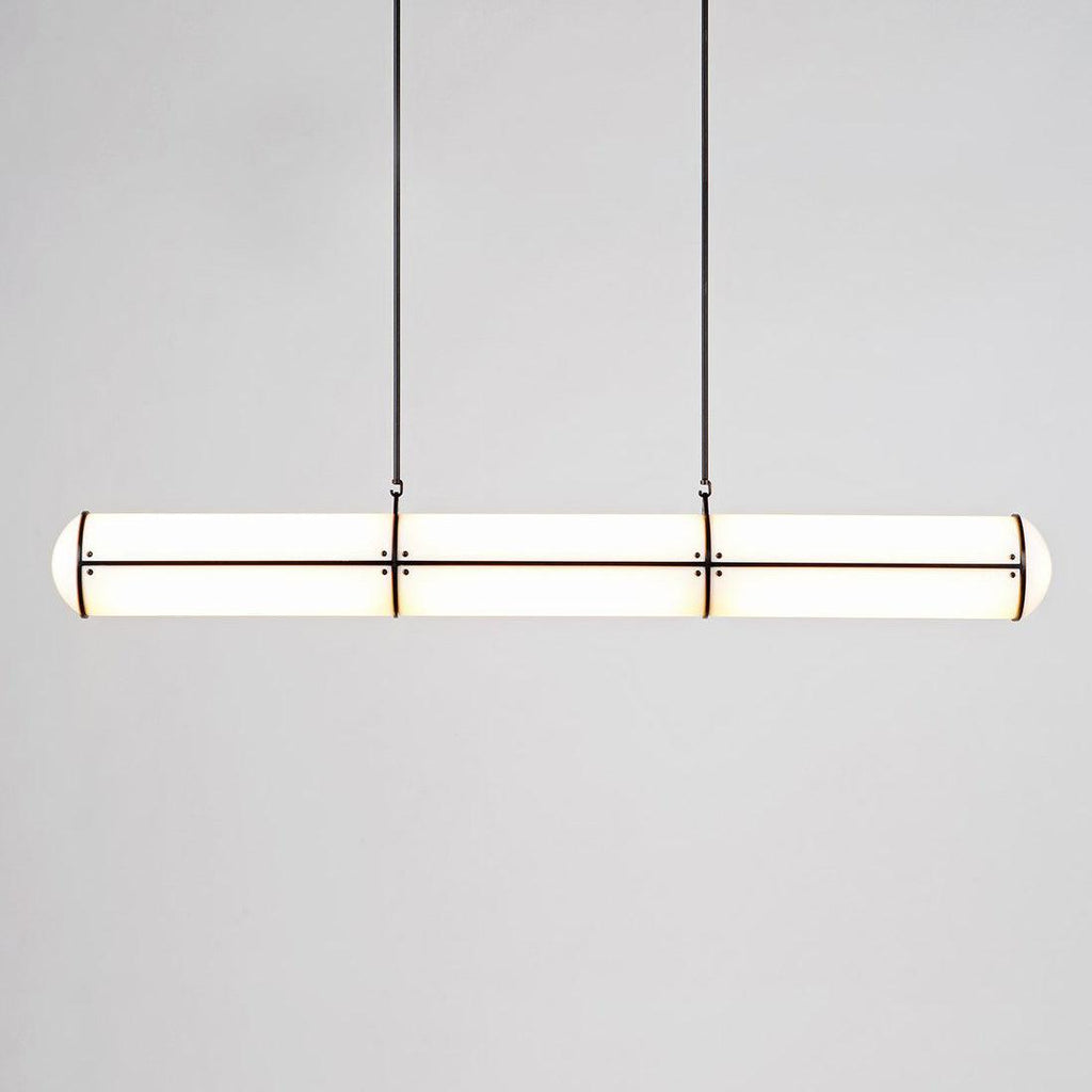 Linear pendant light defining a room with clean horizontal lines