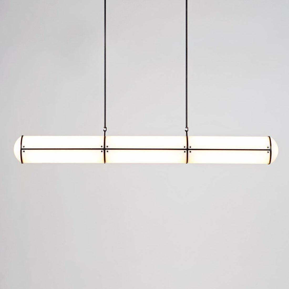 Linear pendant light defining a room with clean horizontal lines