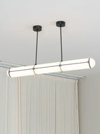 Linear pendant light glowing in a modern architectural interior
