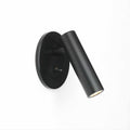 Recessed wall sconce with pivoting LED arm in a styled interior