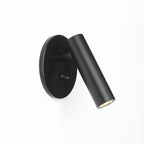 Recessed wall sconce with pivoting LED arm in a styled interior