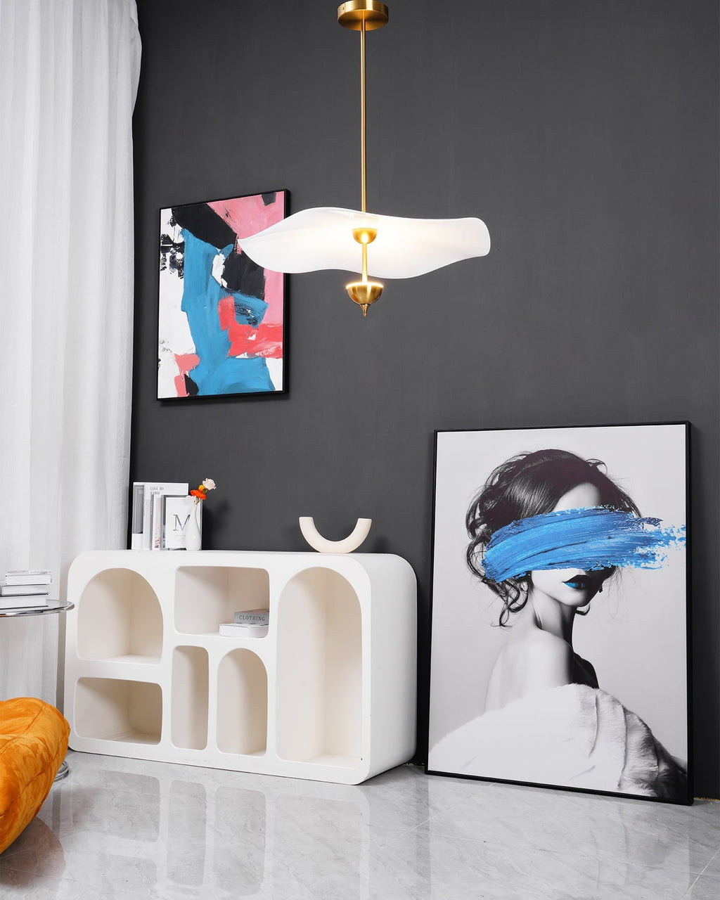 Envolee Double Biscuit pendant light casting soft warm light in a modern room
