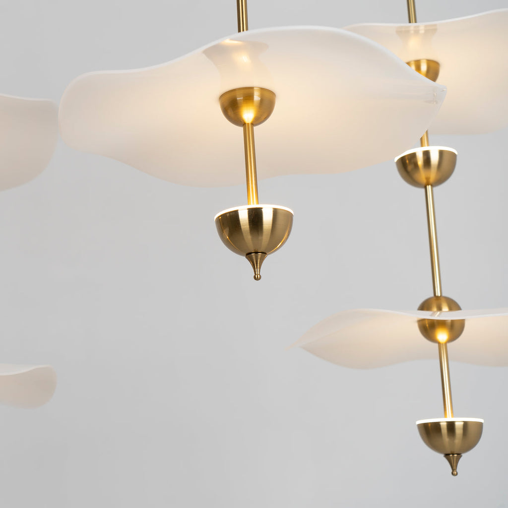 Envolee Double Biscuit pendant light shown against a neutral interior backdrop