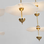 Envolee Double Biscuit pendant light shown against a neutral interior backdrop