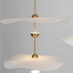 Envolee Double Biscuit gold-bodied pendant light suspended from an adjustable rod