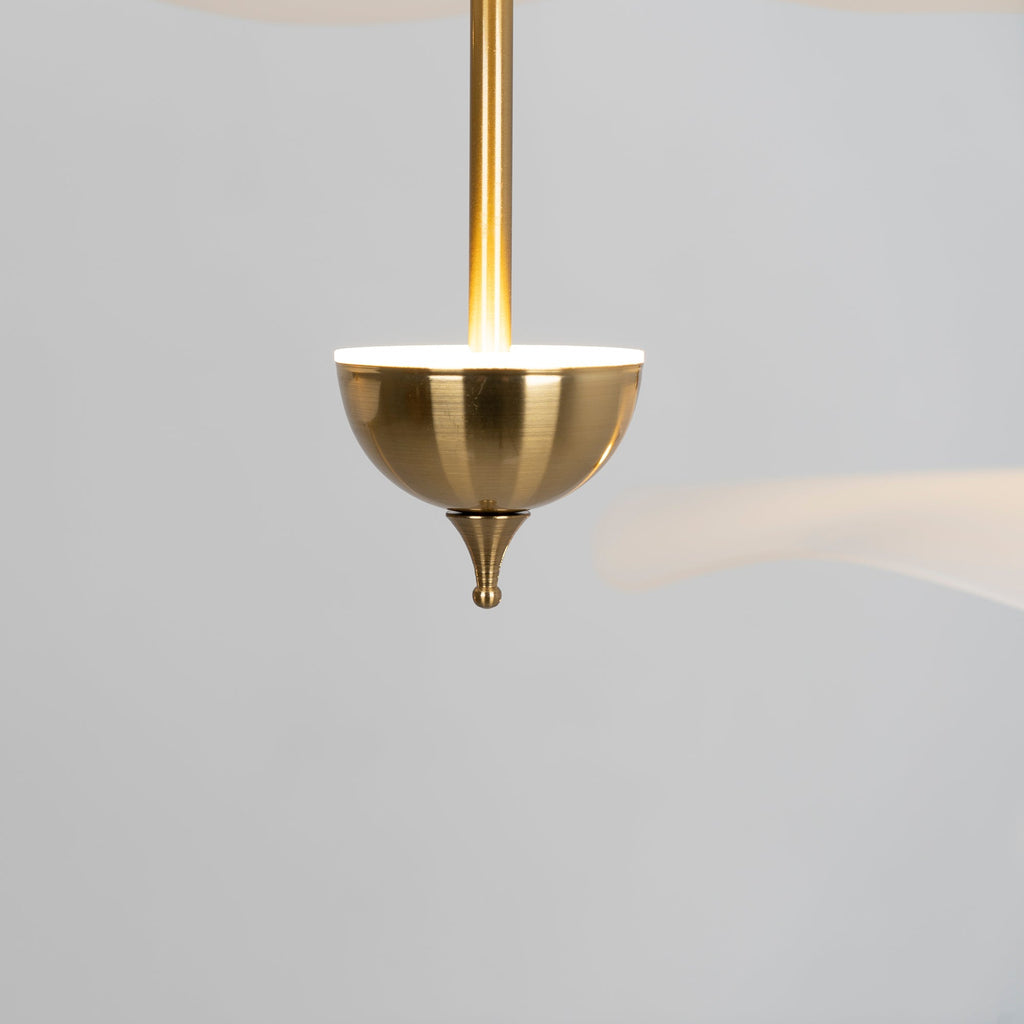 Close detail of the Envolee Double Biscuit pendant's layered white shade and gold frame