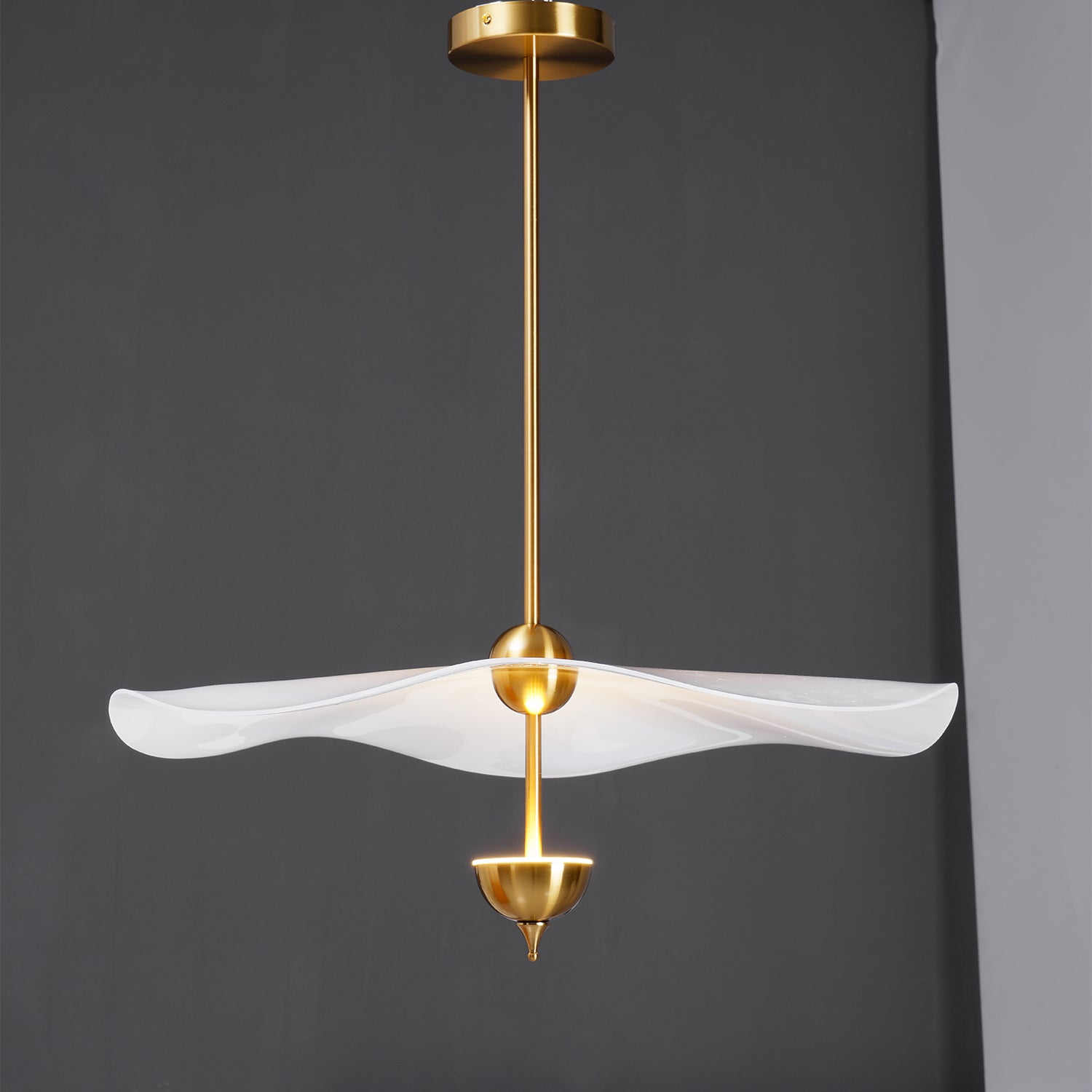 Side profile of the Envolee Double Biscuit pendant showing its sculptural double-shade silhouette