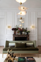 Envolee Double Biscuit gold-bodied pendant light suspended from an adjustable rod