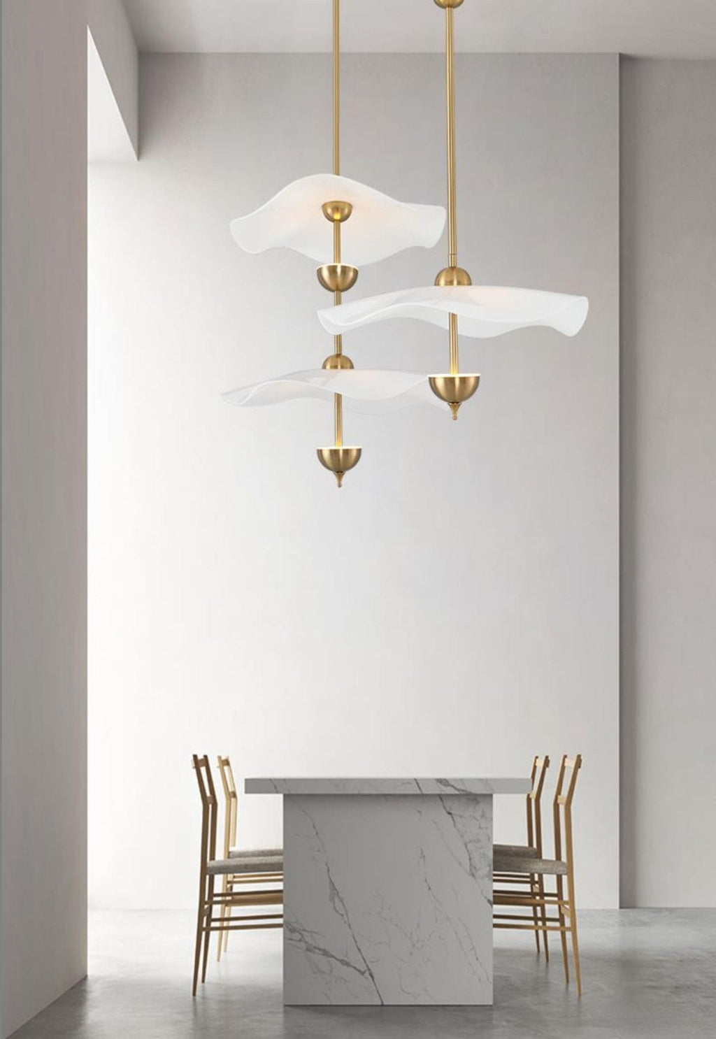 Envolee Double Biscuit pendant light casting soft warm light in a modern room