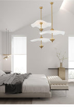 Side profile of the Envolee Double Biscuit pendant showing its sculptural double-shade silhouette
