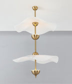 Envolee Double Biscuit pendant light casting soft warm light in a modern room