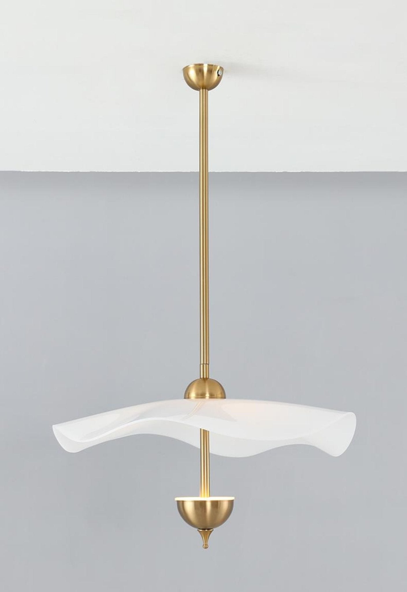 Envolee Double Biscuit gold-bodied pendant light suspended from an adjustable rod