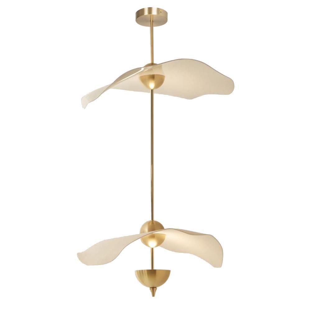 Close detail of the Envolee Double Biscuit pendant's layered white shade and gold frame