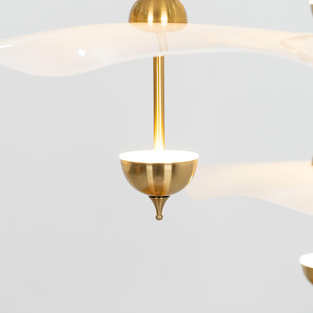 Envolee Double Biscuit pendant light casting soft warm light in a modern room