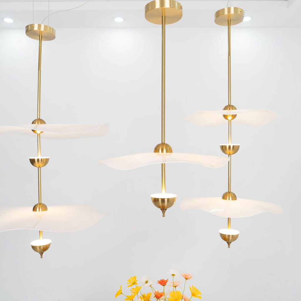 Side profile of the Envolee Double Biscuit pendant showing its sculptural double-shade silhouette