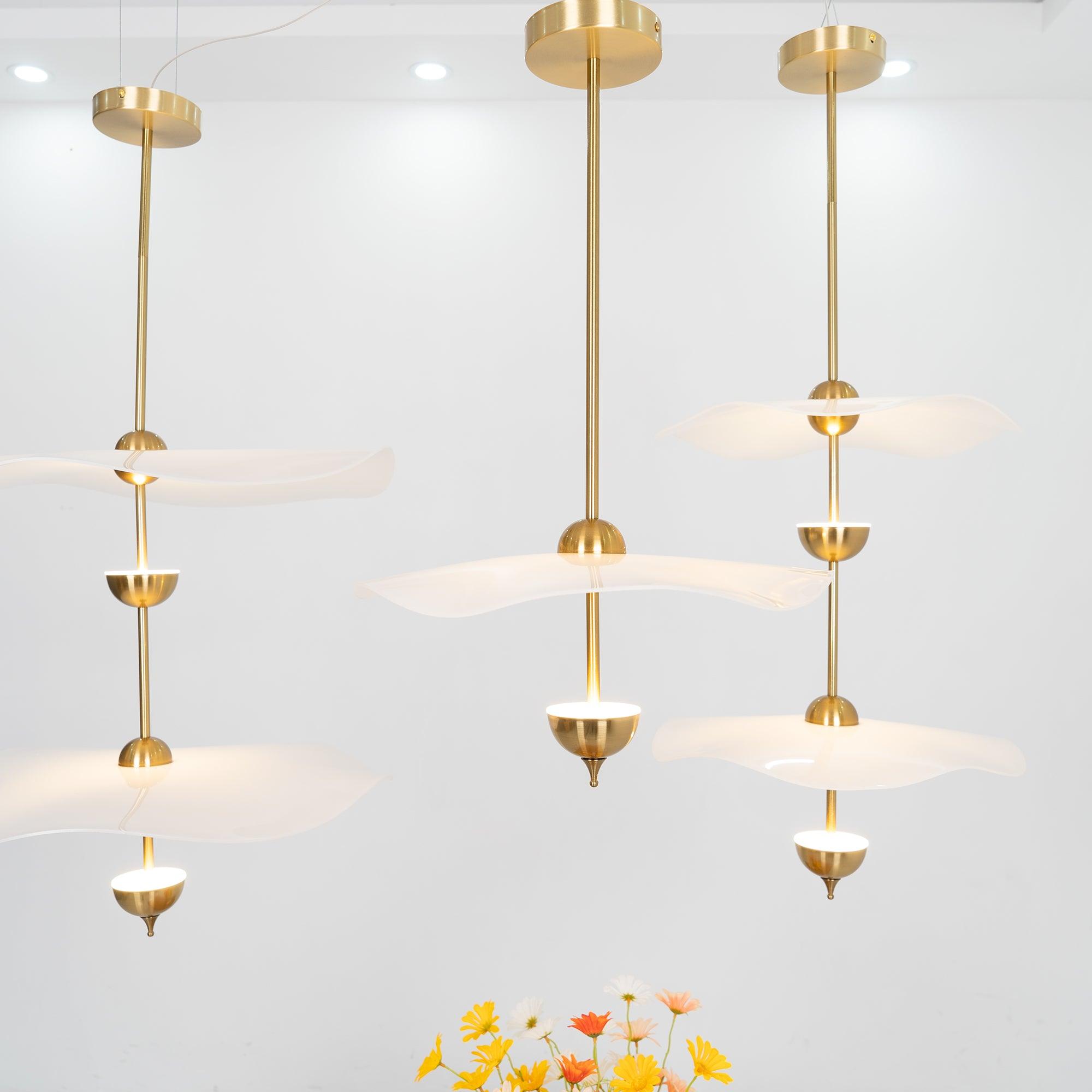 Side profile of the Envolee Double Biscuit pendant showing its sculptural double-shade silhouette