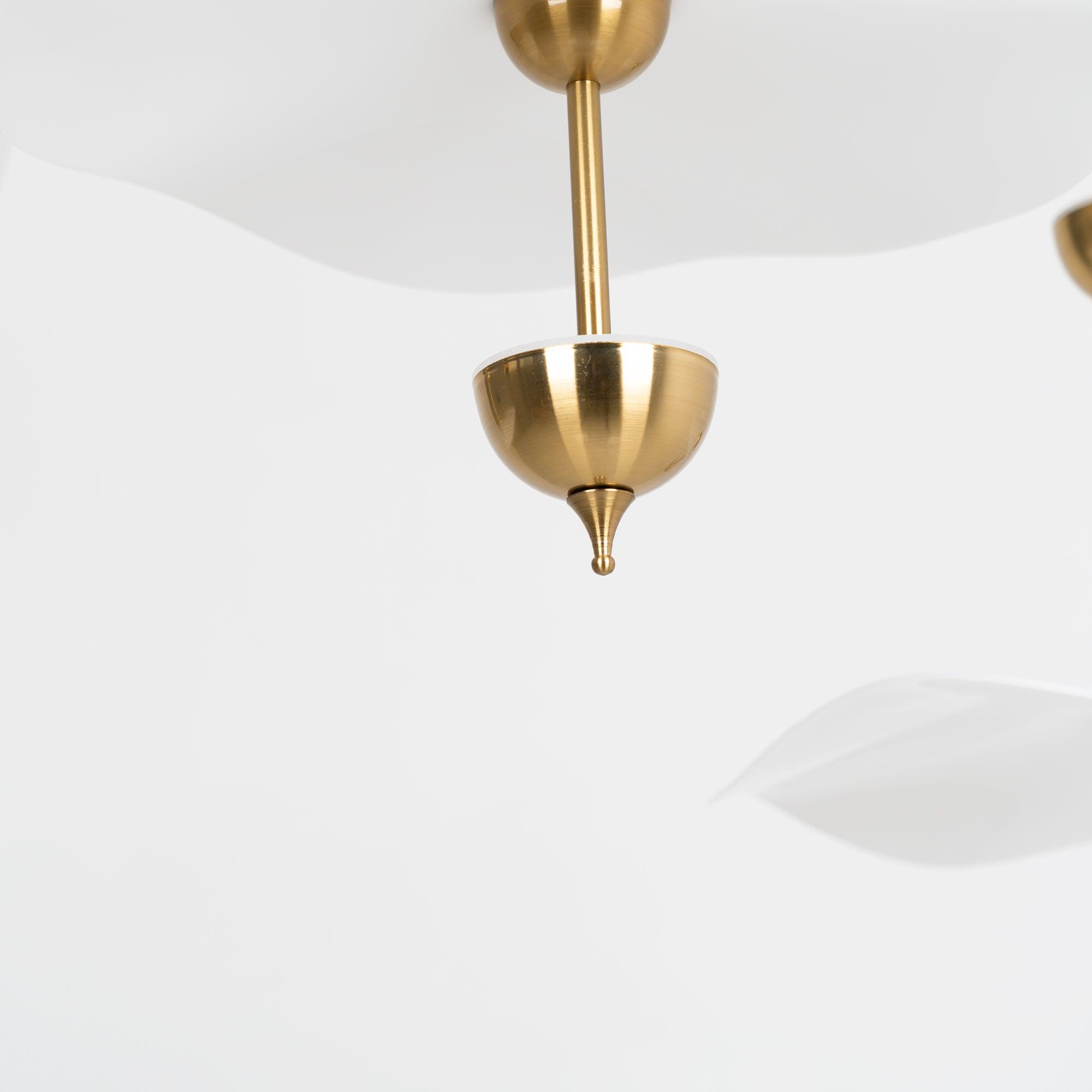 Envolee Double Biscuit gold-bodied pendant light suspended from an adjustable rod