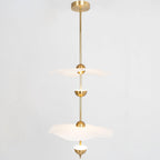 Envolee Double Biscuit pendant light in gold and white hanging above a styled dining table