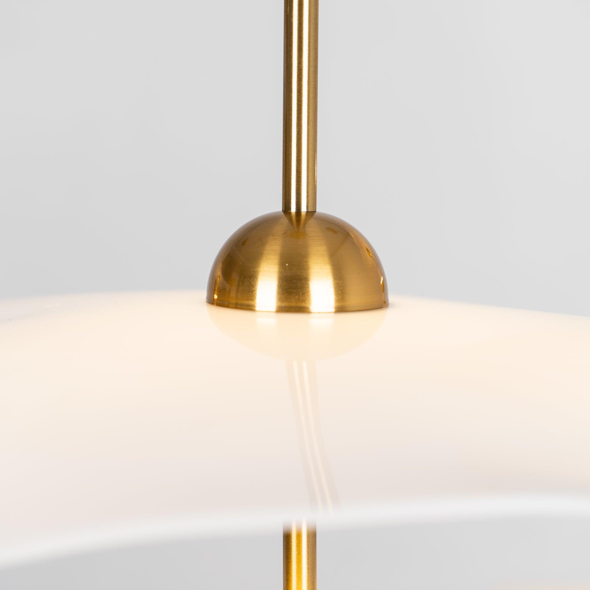 Lifestyle view of the Envolee Double Biscuit pendant light styled in a contemporary home