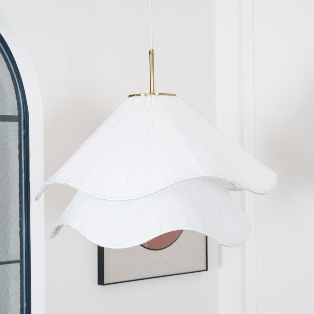 Ethereal Bloom plug-in pendant light in a home setting, layered shade gently lit