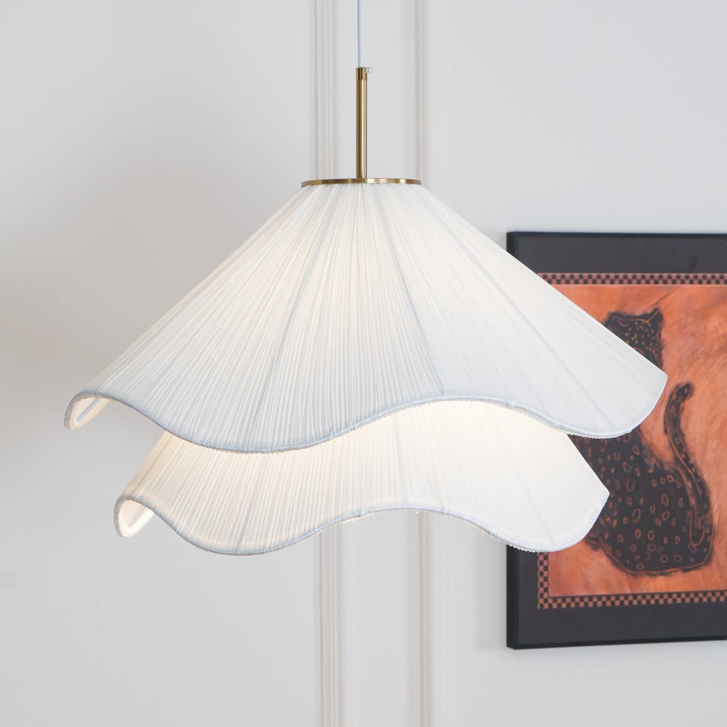 Ethereal Bloom pendant light interior scene with layered fabric softly illuminated