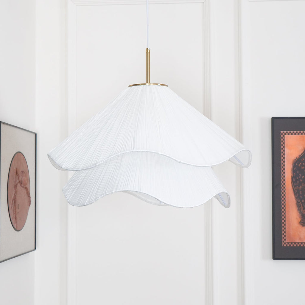 Ethereal Bloom pendant light room view with gold canopy and pleated shade