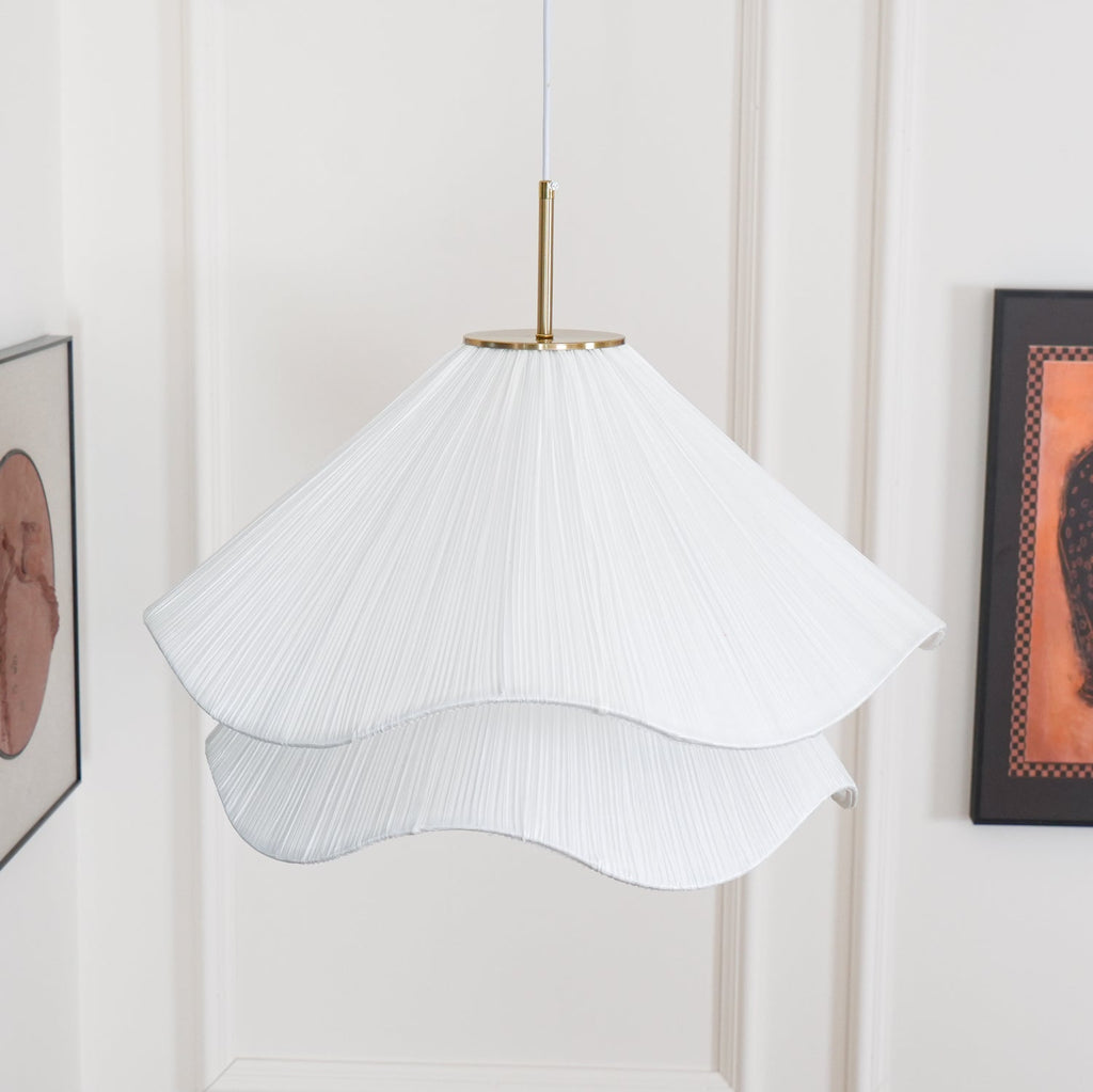 Ethereal Bloom pendant light glowing softly above an interior space
