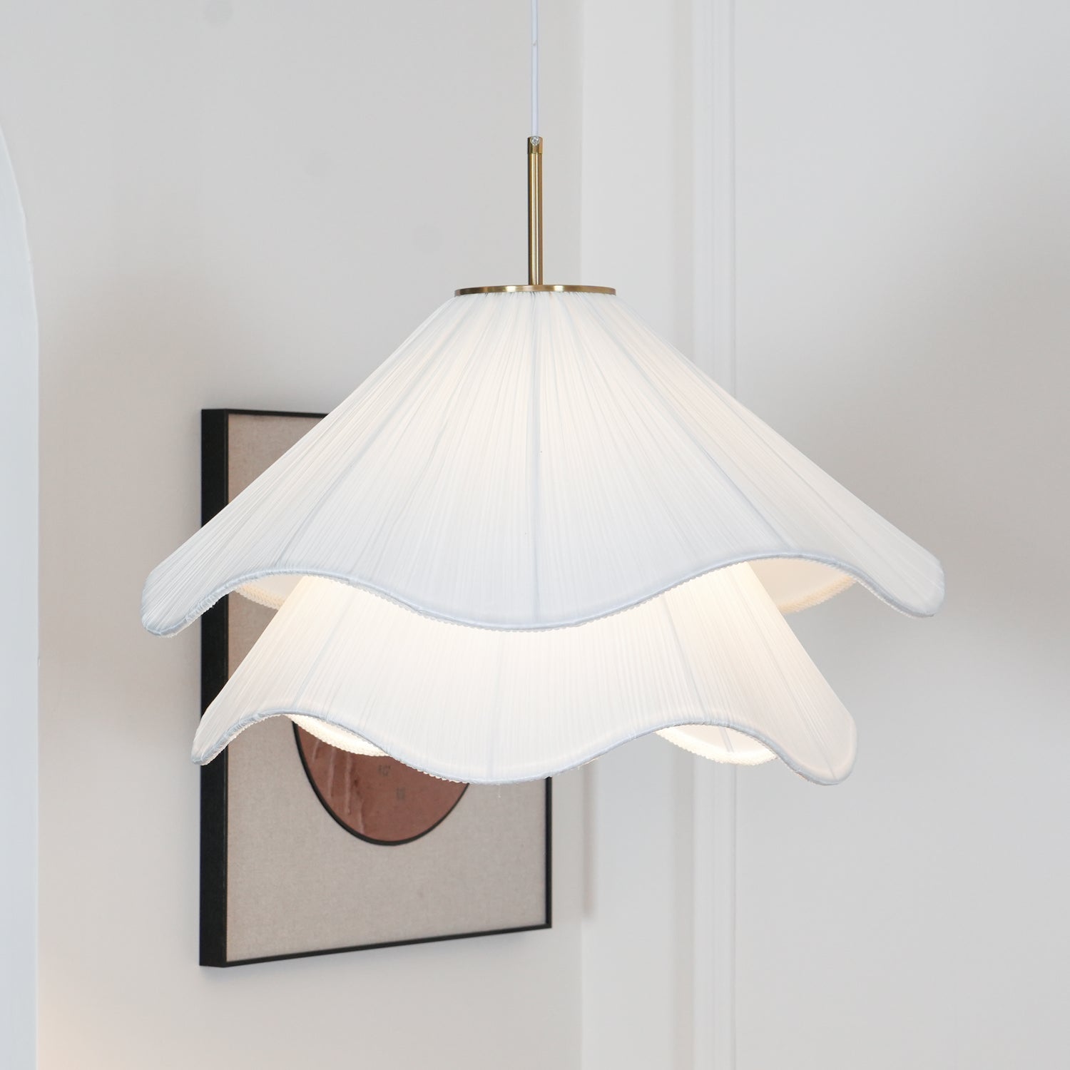 Ethereal Bloom pendant light styled in a home with warm light through the shade